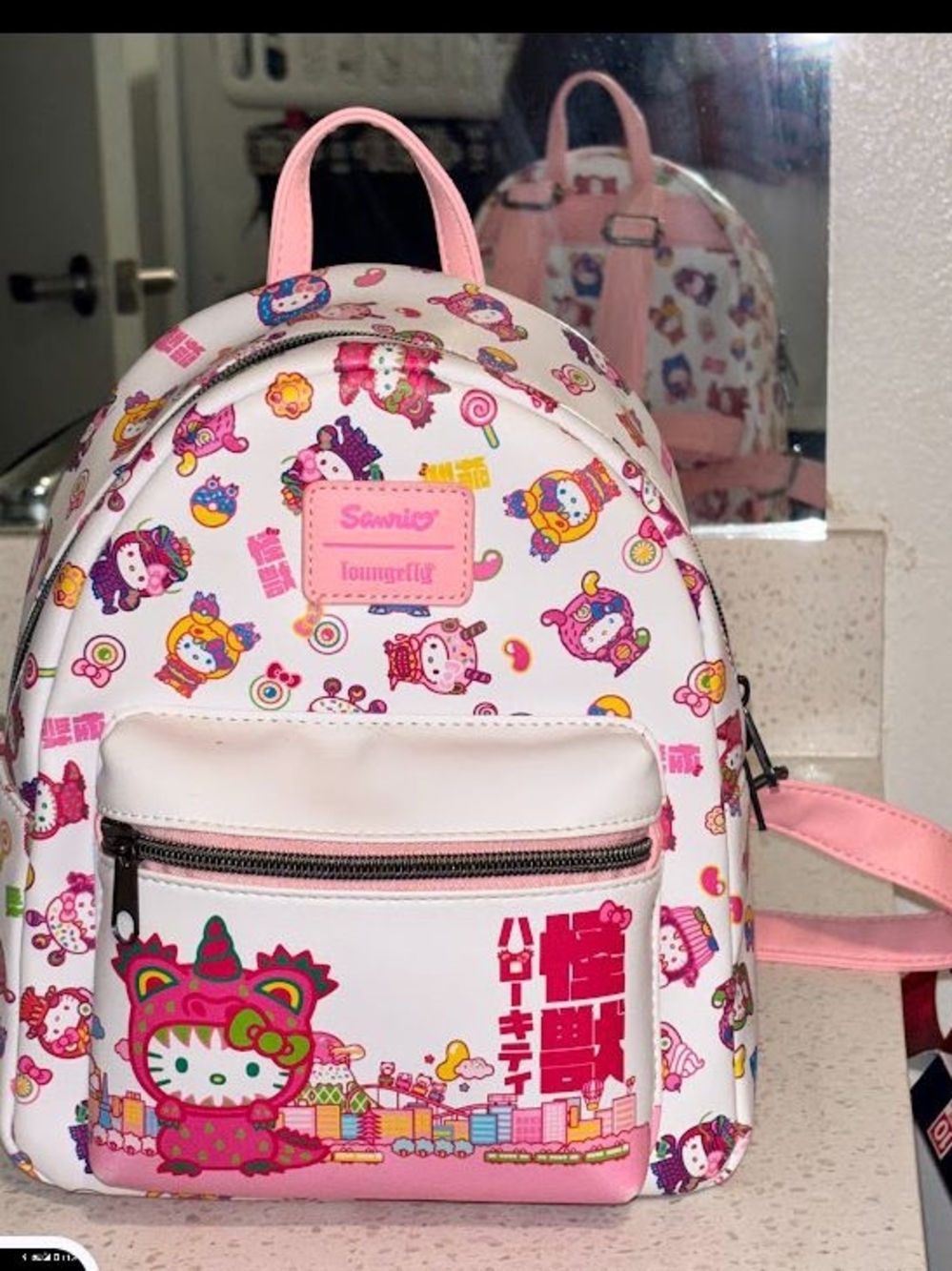 Sanrio Pink & White Hello Kitty Mini Backpack with Multicolor Prints